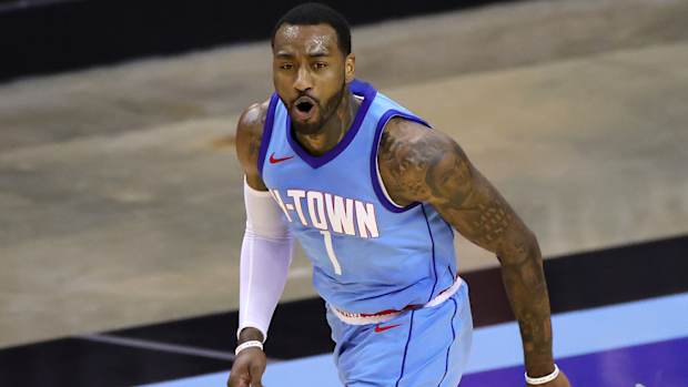 Houston Rockets guard John Wall reacts